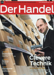 Rene Otto (GF der Rock n Shop GmbH mit iPad und Scanner)